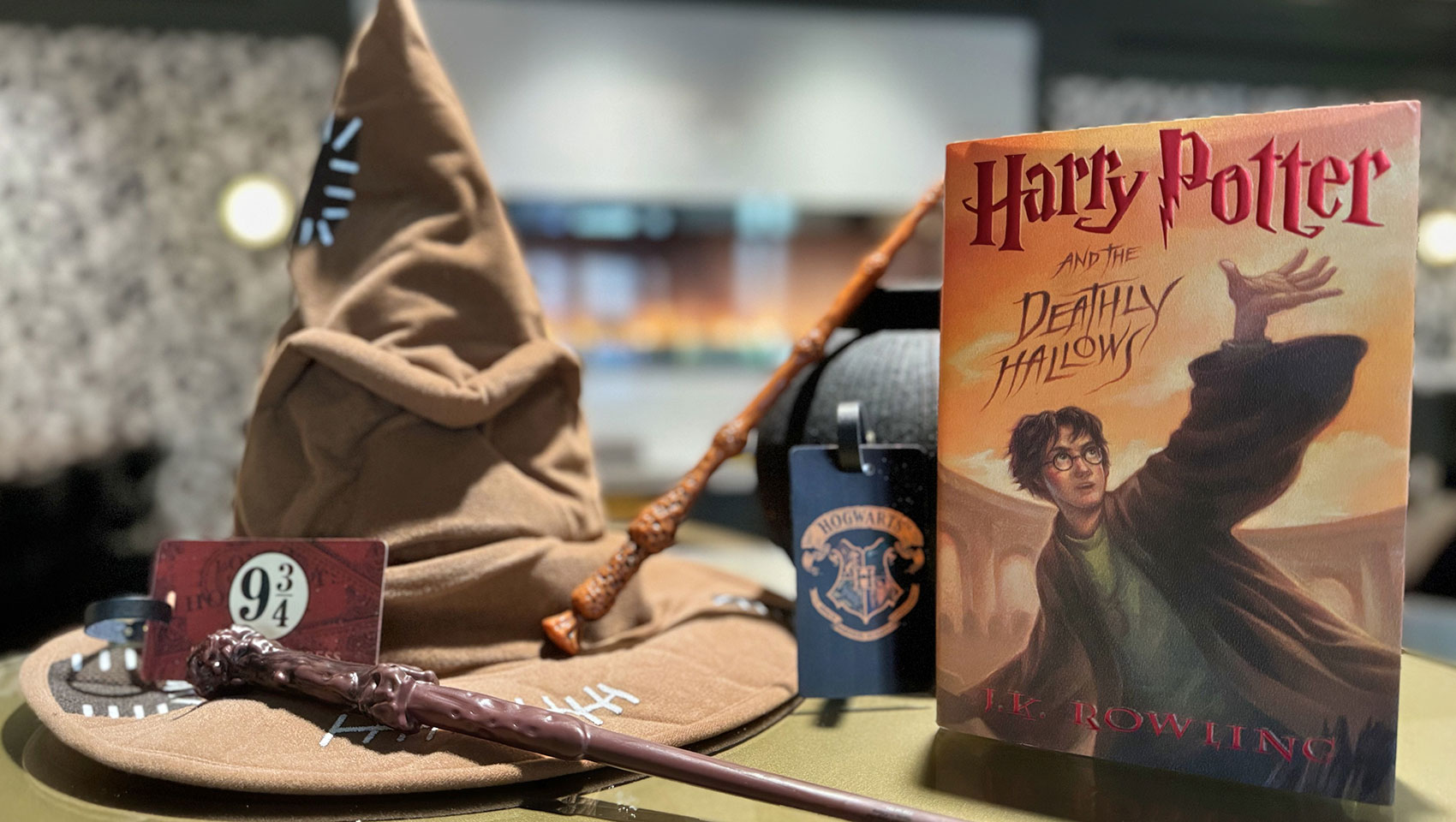 Harry Potter Sorting Hat, wand, luggage tag and book