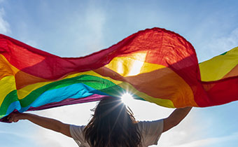 pride flag in the sun